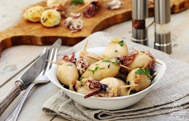 Кальмары, фаршированные анчоусами